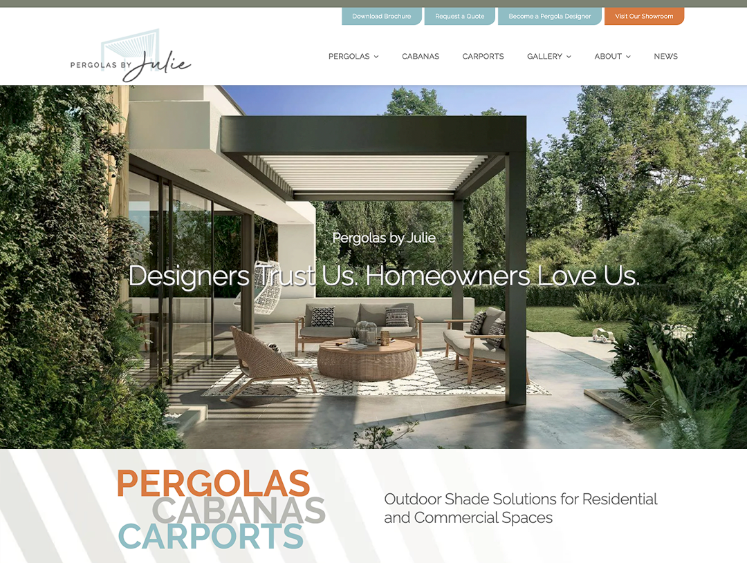 A stylish outdoor patio with a pergola is featured on a website for "Pergolas by Julie." The patio includes modern furniture with trees and greenery surrounding the area. Text on the image reads, "Pergolas by Julie. Designers Trust Us. Homeowners Love Us." and a button says "Visit Our Showroom." A section below highlights services: Pergolas, Cabanas, and Carports.